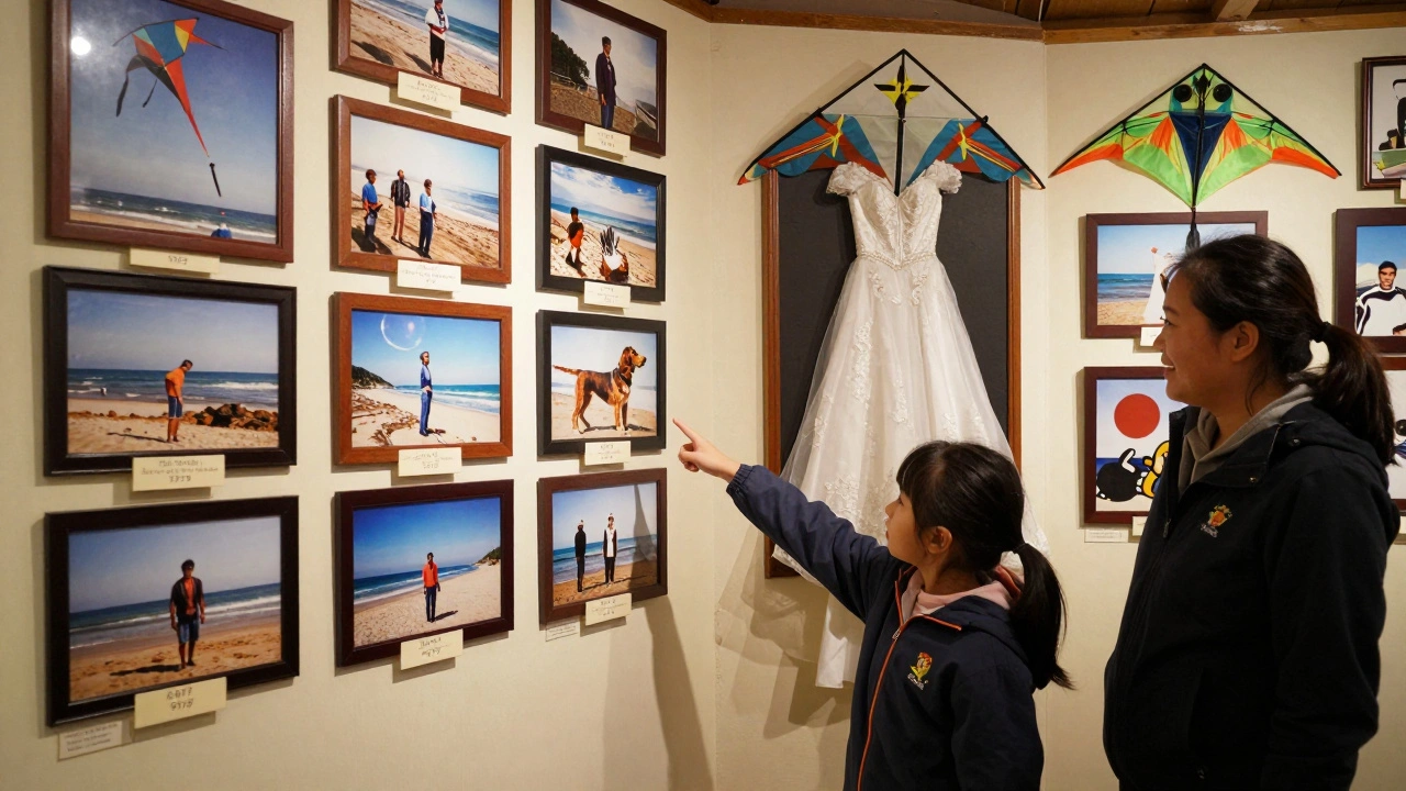 A museum display shows historic kites from Lincoln City’s festival, each with handwritten stories beneath.