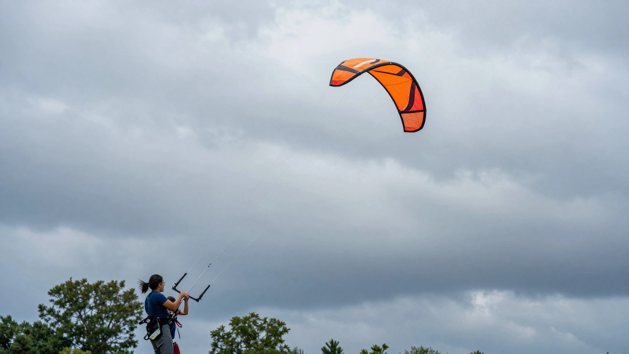 Child and parent flying a dual-line stunt kite in the wind.