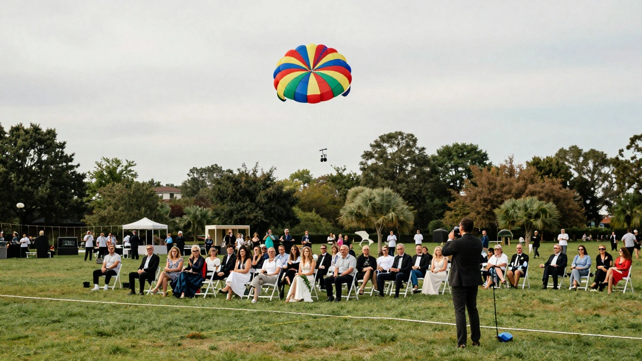 Wedding guests viewing silent flying camera kite