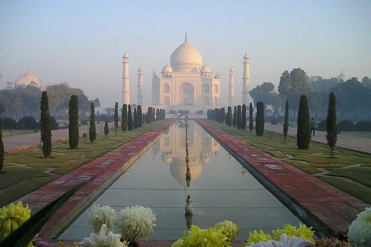 Photo of Taj Mahal in India with reflection in pool