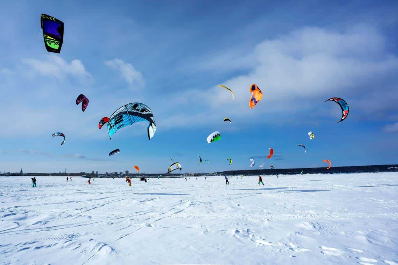Kites over a large snow field